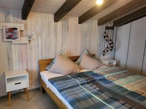 Voodi või voodid majutusasutuse Hotel Platten Apartment toas