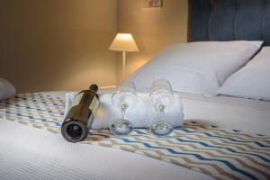 Ένα ή περισσότερα κρεβάτια σε δωμάτιο στο CHIOS HOTEL