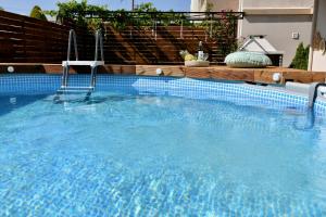 Bazén v ubytovaní Dionysus seaside villa alebo v jeho blízkosti