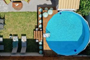 Bazén v ubytovaní Dionysus seaside villa alebo v jeho blízkosti
