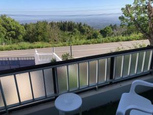 a balcony with a view of a road at VIVENDA AZUL in Monchique