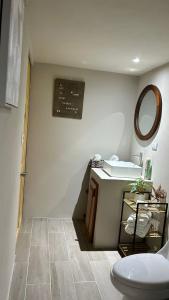 a bathroom with a sink and a toilet at Nani House in Montezuma