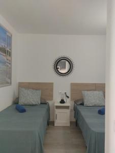 Postel nebo postele na pokoji v ubytování Apartamentos CH 2
