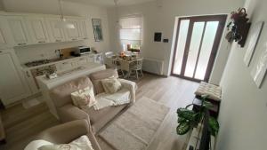 an aerial view of a kitchen and a living room at All'ombra del tiglio Bed&Breakfast in Doberdò del Lago