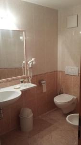 Koupelna v ubytování Hotel Garnì Gardena - Appartments