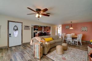 a living room with a couch and a ceiling fan at Chic Silver City Getaway with Patio and Gas Grill in Silver City