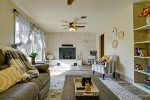 a living room with a couch and a fireplace at Chic Silver City Getaway with Patio and Gas Grill in Silver City