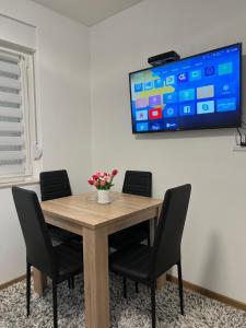 TV a/nebo společenská místnost v ubytování Belle apartmani