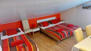 Postel nebo postele na pokoji v ubytování Apartments Kivi