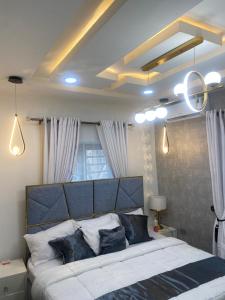 Voodi või voodid majutusasutuse Chizzy Apartment toas