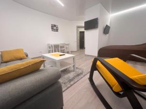 Posezení v ubytování Kepezinski SPA apartments + 8 fotografií