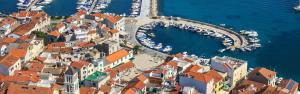 an aerial view of a town with boats in the water at Apartments Ula in Vodice