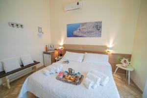 Ένα ή περισσότερα κρεβάτια σε δωμάτιο στο B&B A Due Passi