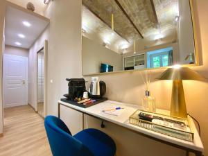 Kuchyň nebo kuchyňský kout v ubytování Queen of Rome Luxury Rooms