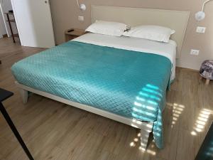 Postel nebo postele na pokoji v ubytování Caramel House & Villa