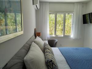 Postel nebo postele na pokoji v ubytování Beachfront apartment Suncana