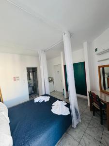 Postel nebo postele na pokoji v ubytování SunnySun Studios