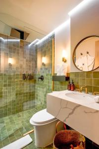 Koupelna v ubytování Wellcomm Spa & Hotel