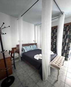 Postel nebo postele na pokoji v ubytování SunnySun Studios