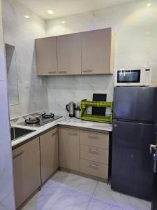 Kuchyň nebo kuchyňský kout v ubytování VHS Vinchee Suites + 27 fotografií