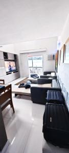 Kuchyň nebo kuchyňský kout v ubytování Cobertura frente mar , um andar , na Marina Piratas com estacionamento gratuito