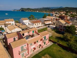 an aerial view of a town next to the water at Alexandra's Apartments in Sidari