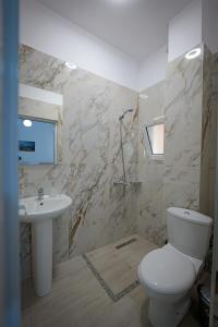 Koupelna v ubytování Hotel Veliaj