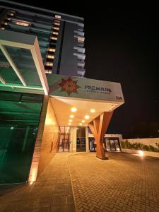 a building with a star on the top of it at Flat Beira-mar - Pepper Village in Salvador