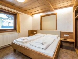 Ένα ή περισσότερα κρεβάτια σε δωμάτιο στο Werner