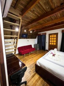 Voodi või voodid majutusasutuse Hotel el viajero toas