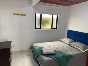 Postel nebo postele na pokoji v ubytování Aparta Estudio 101 NUEVO