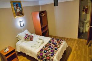 Letto o letti in una camera di Hotel Joram