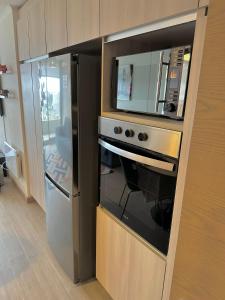 O bucătărie sau chicinetă la Departamento 1 Dormitorio en el Centro