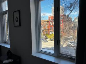 a window with a view of a street at Sweet Home in Toronto