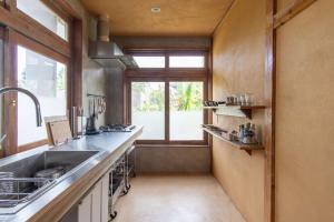 a kitchen with a sink and a window at Miyakojima - House - Vacation STAY 77627v in Sawada