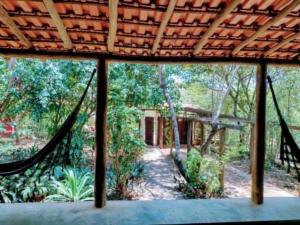 a view from a hammock in a house at Casa Rosa Chá em Lençóis in Lençóis