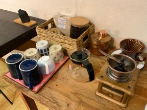 a table with a tray with various items on it at Mashuko Youth Hostel - Vacation STAY 01026v in Teshikaga