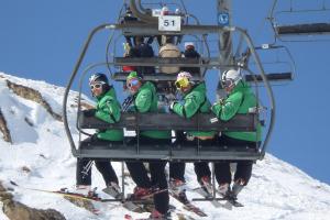 a group of people on a ski lift at Hotel Rural El Fundil in El Pino