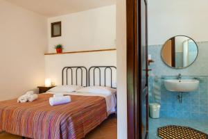 Ένα μπάνιο στο Il Pozzo - Bilocale - 1 camera da letto - 1 bagno - soggiorno cucina - in zona esclusiva