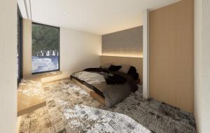 Кровать или кровати в номере Hakuba Amber Resort by Jade Group