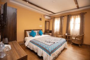 Letto o letti in una camera di Hong Si Hotel- A Home Away from Home