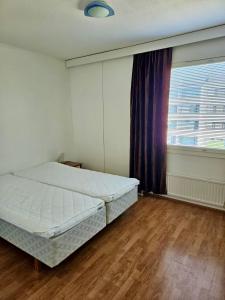 Postel nebo postele na pokoji v ubytování Apartments in Finland N & P