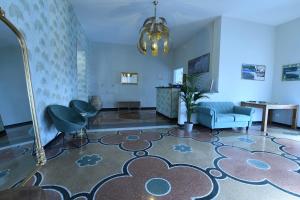 Posezení v ubytování Hotel La Tavernetta