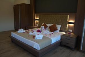 Postel nebo postele na pokoji v ubytování ASPAT HOTEL BODRUM - Beach&Restaurant