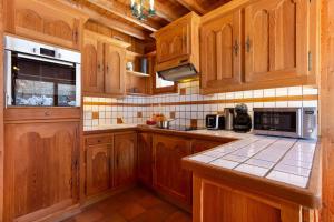 Kuchyň nebo kuchyňský kout v ubytování Chalet Vaffier - Happy Rentals