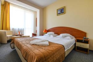 Postel nebo postele na pokoji v ubytování Hotel Rio