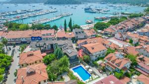 an aerial view of a town with a harbor at Göcek Centre Hotel in Göcek