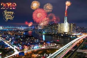 a view of a city with fireworks at night at Vinhome Landmark Suites in Ho Chi Minh City