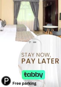 Postel nebo postele na pokoji v ubytování Al BARAKAH HOTEL