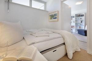 En eller flere senge i et værelse på Kuschelnest